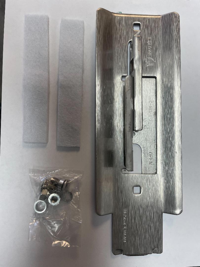 This Latch fits the TRAC-RITE ORIGINAL MODEL 940 (discontinued) ROUNDED RIBBED PANEL DOORS 2 Bolt Latch.  This latch DOES NOT WORK with the Guardian II cylinders.